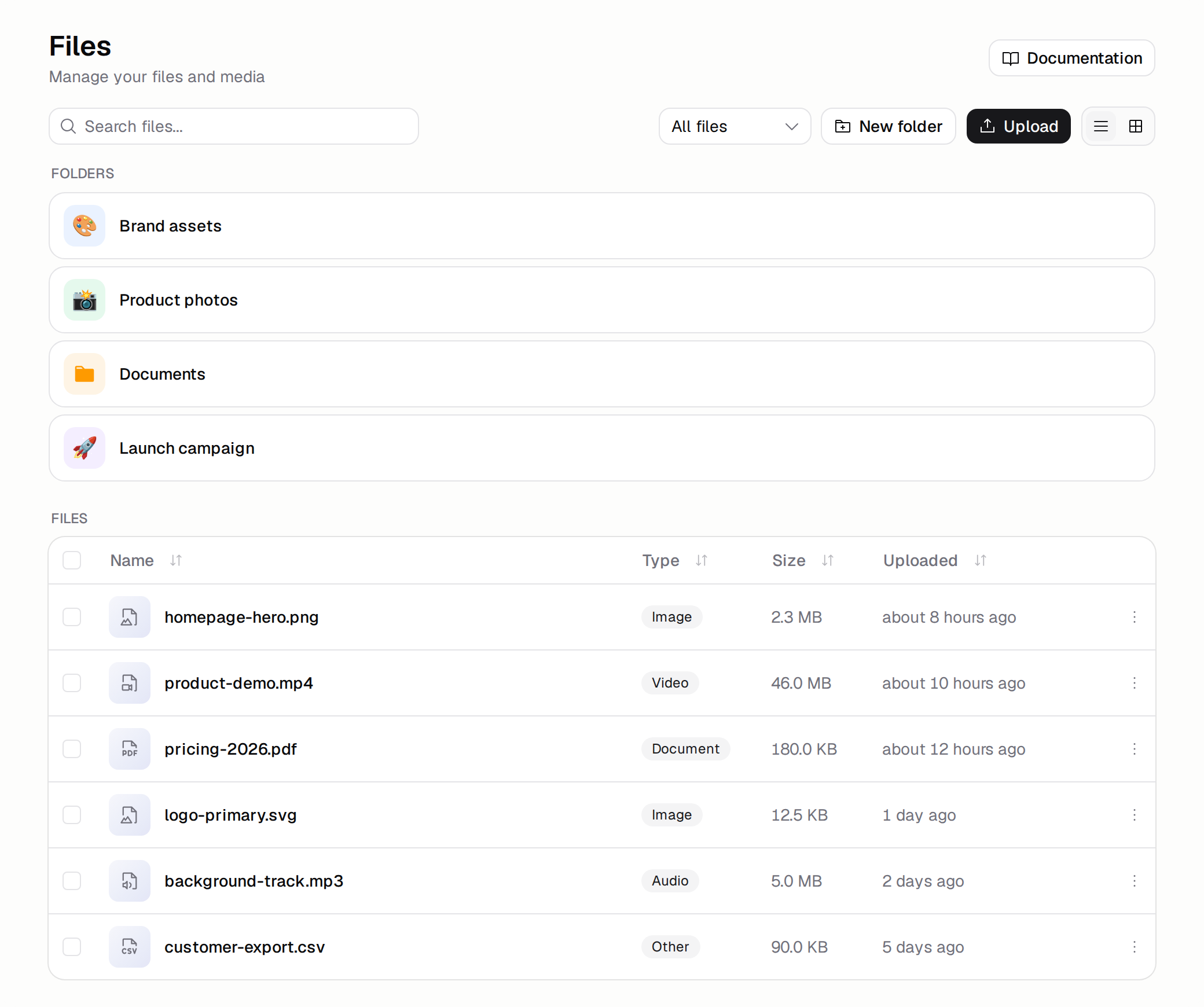 Files section with four color-coded folders and a table of files showing type, size, and upload time
